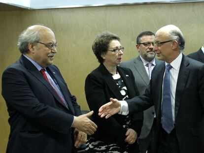 El consejero de Economía, Andreu Mas-Colell, junto al ministro de Hacienda, Cristóbal Montoro.