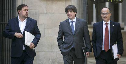 Oriol Junqueras, Carles Puigdemont y Jordi Turull acuden a la reuni&oacute;n del Gobierno. 