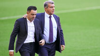 Joan Laporta y Xavi Hernández, en una foto de archivo.