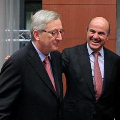 El ministro de Economía español, Luis de Guindos, el primer ministro de Luxemburgo y presidente del Eurogrupo, Jean-Claude Juncker y la directora gerente del FMI, Christine Lagarde, durante la reunión del Eurogrupo