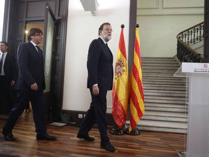 Mariano Rajoy junto al presidente catal&aacute;n Carles Puigdemont.
