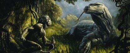 Uns recreación del 'Homo floresiensis' enfrentándose a un lagarto gigante.