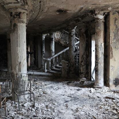 FILE - A view inside the Mariupol theater damaged during fighting in Mariupol, in territory under the government of the Donetsk People's Republic, eastern Ukraine, Monday, April 4, 2022. Ministers from dozens of nations are meeting on Thursday, July 14, 2022 in the Netherlands to discuss with the International Criminal Court's chief prosecutor how best to coordinate efforts to bring to justice perpetrators of war crimes in Ukraine. (AP Photo/Alexei Alexandrov, File)