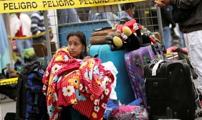 A Venezuelan migrant awaits passage to enter Ecuador in 2019.