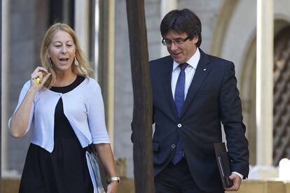 Carles Puigdemont y Neus Munté.