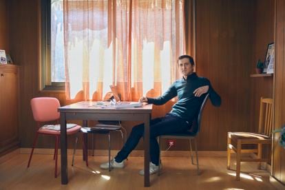 Daniel López Valle, in front of the desk at his home in Barcelona.