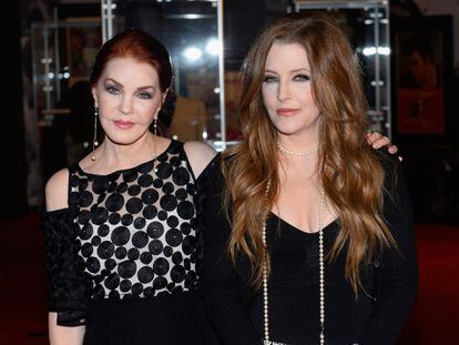 LAS VEGAS, NV - APRIL 23:  Actress Priscilla Presley (L) and singer Lisa Marie Presley attend the ribbon-cutting ceremony during the grand opening of "Graceland Presents ELVIS: The Exhibition - The Show - The Experience" at the Westgate Las Vegas Resort & Casino on April 23, 2015 in Las Vegas, Nevada.  (Photo by Bryan Steffy/WireImage)