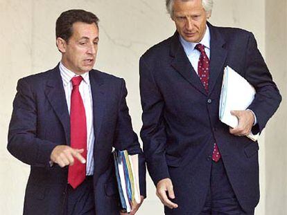 Nicolas Sarkozy y Dominique de Villepin, el 1 de septiembre de 2004 en París.