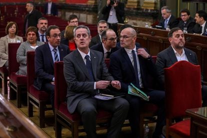 Los políticos catalanes Joaquim Forn, Raül Romeva y Oriol Junqueras, acusados de sedición, en el Tribunal Supremo durante el juicio en febrero de 2019.