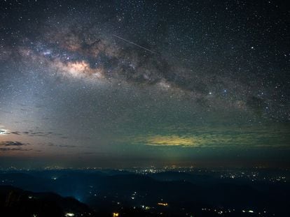 The Milky Way and a satellite trail from a viewing point in Haputale, Sri Lanka.