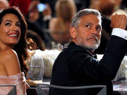 George Clooney y su esposa Amal.