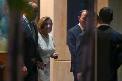 Nancy Pelosi, Speaker of the US House of Representatives, leaves the Shangri Hotel after a reception hosted by the US Chamber of Commerce in Singapore on Monday.
