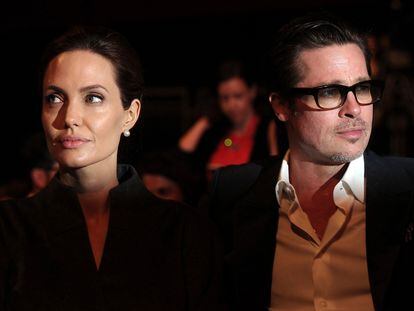 La actriz y directora Angelina Jolie y su entonces marido, el actor Brad Pitt, en un foro sobre violencia sexual en junio de 2013.