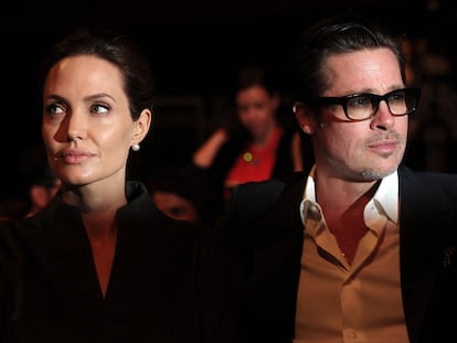 La actriz y directora Angelina Jolie y su entonces marido, el actor Brad Pitt, en un foro sobre violencia sexual en junio de 2013.