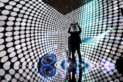 A visitor tries out an experience in the metaverse in a pavilion at the Mobile World Congress in Barcelona last Monday.