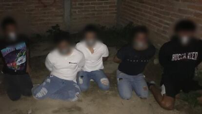 Photograph showing five young men tied up in Jalisco, Mexico.
