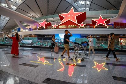 Travelers at Beijing-Daxing International Airport on August 31