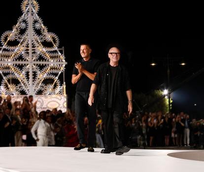 Stefano Gabbana and, on the right, Domenico Dolce, after the show of their Alta Moda collection presented in Alberobello.