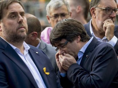 El presidente de la Generalitat, Carles Puigdemont, acompa&ntilde;ado del vicepresidente, Oriol Junqueras, en la manifestaci&oacute;n del pasado s&aacute;bado.