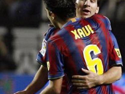 Leo Messi y Xavi Hernández, dos jugadores del Barcelona F.C.