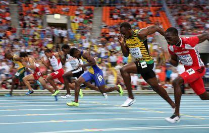 Bolt, durante su serie de 100 metros.