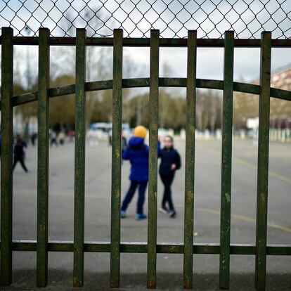 Young students play in a public school, in Vitoria, northern Spain, Monday, March 9, 2020. Health authorities in the Madrid region say that infections for the new coronavirus have more than doubled in the past 24 hours. (AP Photo/Alvaro Barrientos)