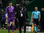 Real Madrid's Gareth Bale walks after sustaining an injury during Champions League match against Sporting in Lisbon