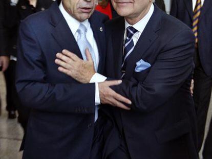 El presidente del Tribunal Superior de Justicia de Valencia, Juan Luis de la Rúa (izquierda), y el del Poder Judicial, Carlos Dívar.