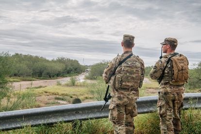 Members of the US National Guard patrol near an unfinished section of the border wall in La Joya, Texas.