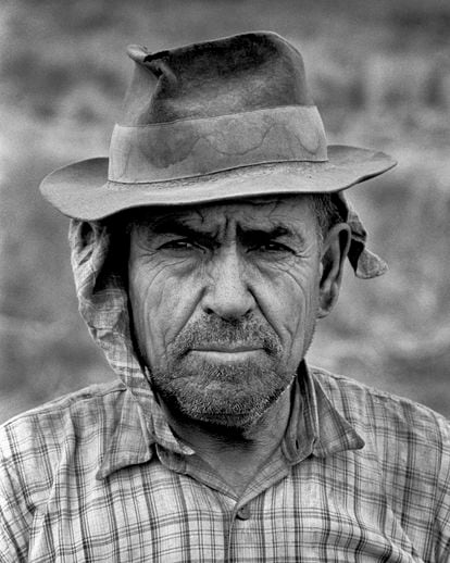 A farm laborer poses for the photographer in the town of Évora, in the Alentejo region.