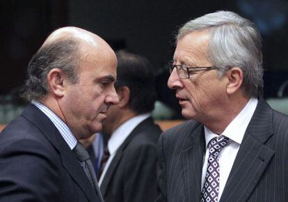 El ministro de Economía con el presidente del Eurogrupo en Bruselas.
