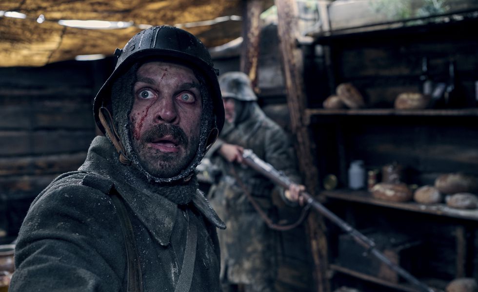 This image released by Netflix shows Edin Hasanović in a scene from "All Quiet on the Western Front." (Reiner Bajo/Netflix via AP)