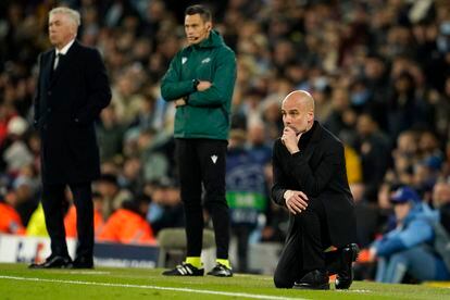 Carlo Ancelotti, coach of Real Madrid and Pep Guardiola, coach of Manchester City follow the game on the wing.