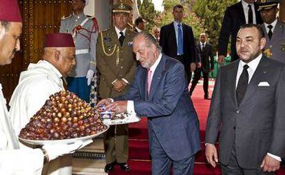 El Rey durante su encuentro con Mohamed VI en Marraquech hoy.