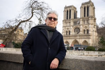 French journalist Didier Rykner, promoter of the petition not to replace six stained glass windows of Notre Dame, in front of the cathedral on December 27, 2023.