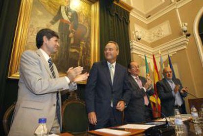 Pleno del Ayuntamiento de Castellón en el que Fabra (segundo por la izquierda) es sustituido.