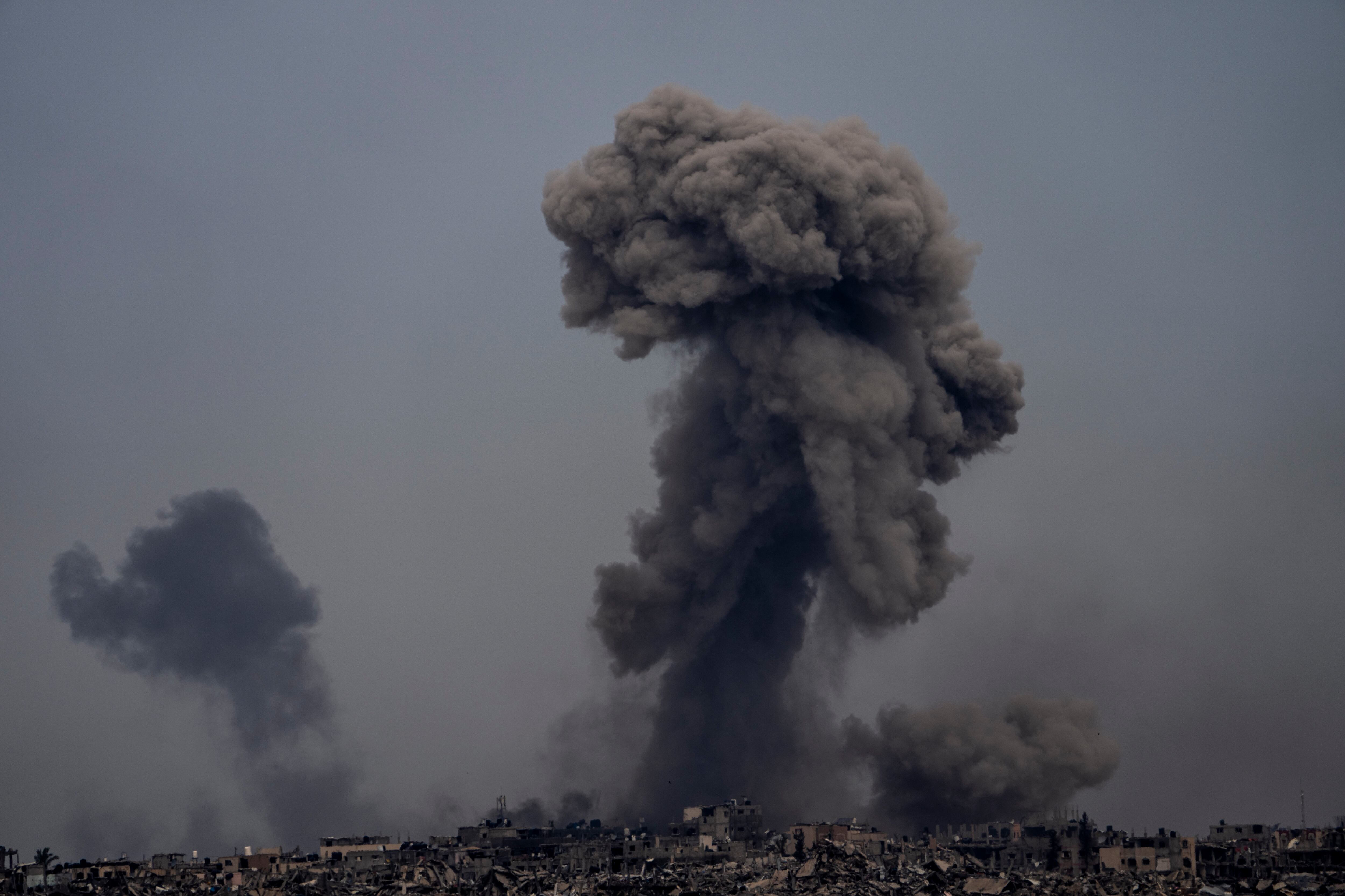 Smoke and explosions rise inside the Gaza Strip, as seen from southern Israel, Sunday, Sunday, March 17, 2024. (AP Photo/Ariel Schalit)