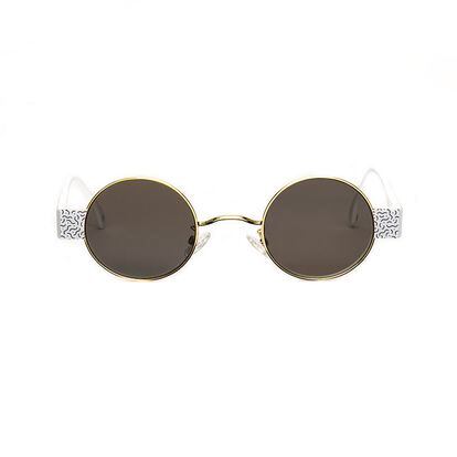 Gafas de sol modelo Memphis de Alfred Kerbs, lentes de cristal redondas y pequeñas inspiradas en modelos de los año 80.