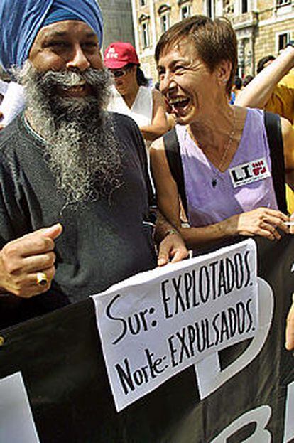 Manifestación en Barcelona contra un desalojo de inmigrantes.