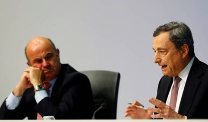 Mario Draghi y Luis de Guindos