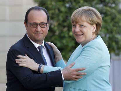 Hollande y Merkel, en su encuentro en el El&iacute;seo.