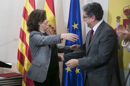 La vicepresidenta del Govern, Soraya Sáenz de Santamaria, i Enric Millo.
