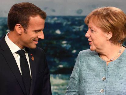 Angela Merkel y Emmanuel Macron durante el G7 en Charlevoix, Canad&aacute;