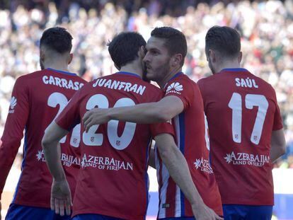 Koke y Juanfran celebran el primer gol del Atlético al Granada.