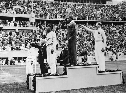 The German Luz Long performs the Nazi salute during an awards ceremony, during the 1936 Berlin Olympic Games. 