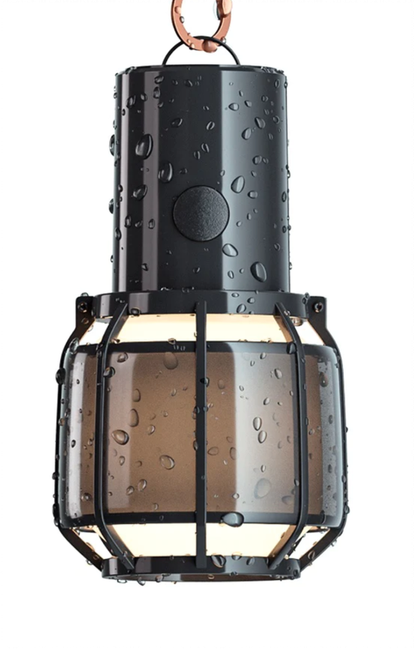 Portable lamp with a Joan Gaspar design inspired by garage lanterns.