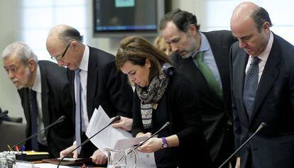 Sáenz de Santamaría, Montoro, De Guindos y Beteta, ayer.