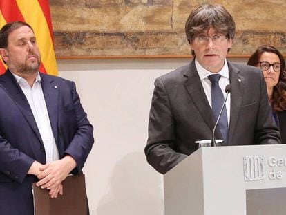 Oriol Junqueras, Carles Puigdemont y Merc&egrave; Conesa, en un acto este viernes. 