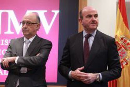 Los ministros de Hacienda y Econom&iacute;a, Crist&oacute;bal Montoro y Luis de Guindos.