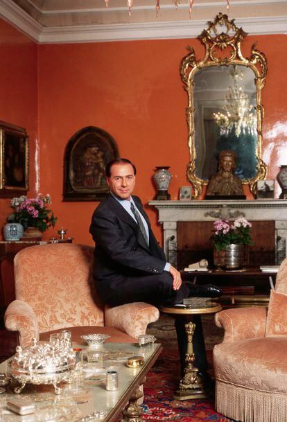 Silvio Berlusconi poses in the main hall of Villa San Martino, near Milan, in 1986. 